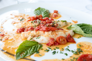 Cod with tomato and basil