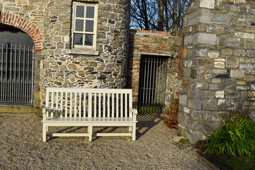 Benches in a european garden on a clear winters day