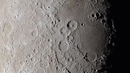 Moon surface close up. Craters and furrows on the surface of the earth's satellite. (Elements of this image furnished by NASA) © EvgeniyQW