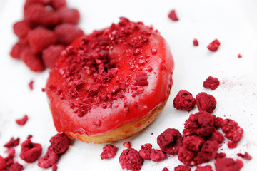 Raspberry donut for breakfast, sweet addiction. 