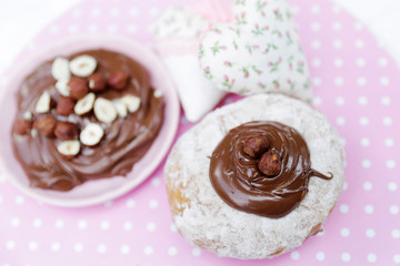 Sweet donut with chocolate, sweet breakfast. 