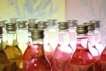 Bottles of handmade shower gel in local store.