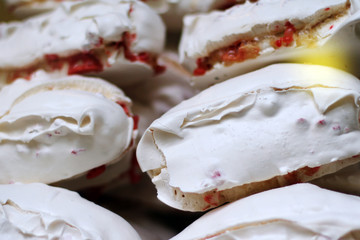 Meringues in window. Traditional French sweets. 