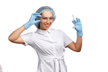 Girl doctor beautician in a white coat, blue cap and gloves. Isolated on white background