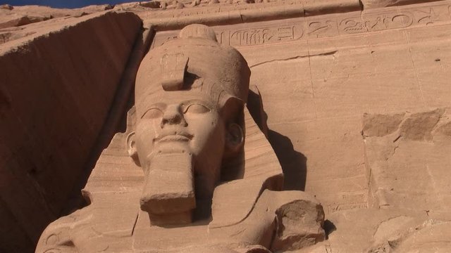 Abu Simbel - Colossus of Ramesses II, low angle shot, on the Facade of the Great Temple