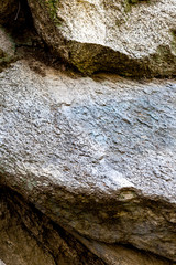 Sandstone and basalt with moss and lichen