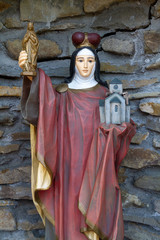 Fototapeta na wymiar Tylicz, Poland. 2019/8/8. A statue of Saint Agnes of Bohemia (of Prague). 