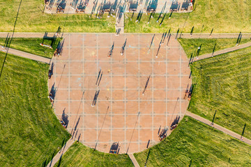 A crowd of people at the festival on the square in the city, top view