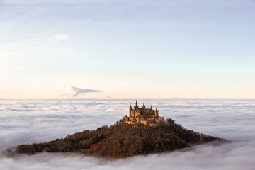 Hohenzollern castle above the clouds fog