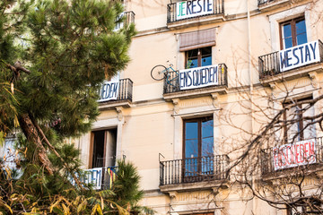 Residential building is occupied by unauthorized squatters and transformed into illegal squat. Anarchist hand-written banner from the window.