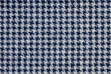 Blue, grey Wool Background Texture. Coat close-up. Expensive men's suit fabric. Houndstooth seamless