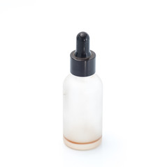 Empty transparent vape liquid bottle with residue isolated on the white background