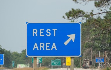 Blue Rest Area Sign with Arrow