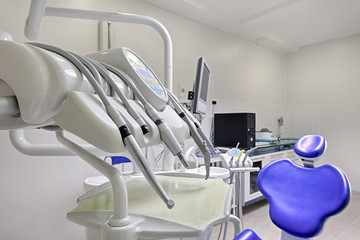Fototapeta premium Dentist's office interior with modern chair and special dentisd equipment
