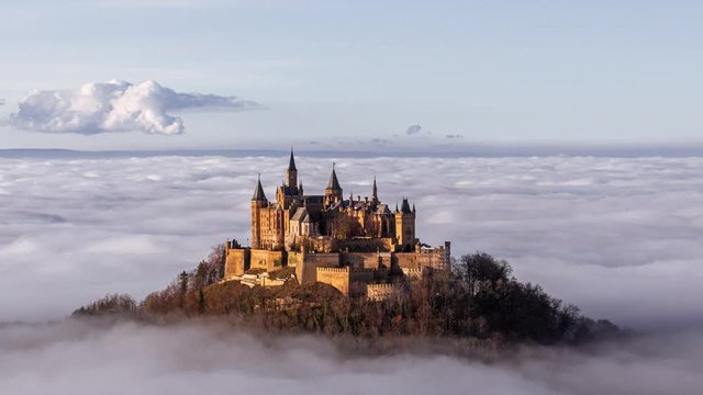 Hohenzollern castle foggy above clouds timelapse