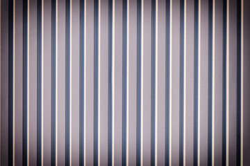 Fototapeta premium Corrugated metal sheet close up. Empty background for layouts and sites. Photo with vignette.