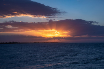 Fototapeta premium cloudy sunset on beach