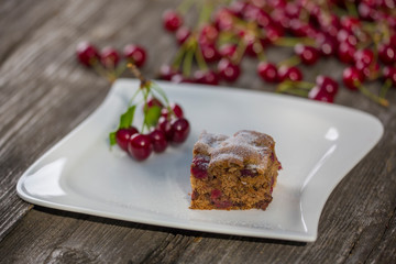 Home made cherry cake with vanilla and icing sugar