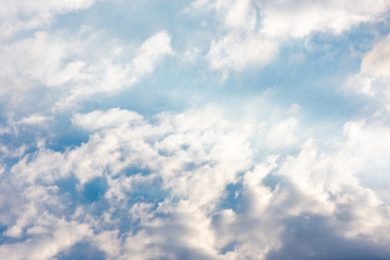  bright sky with clouds and glare from the sun's rays