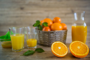 Fresh orange juice in the glass jar.