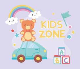 Obraz na płótnie Canvas kids zone, teddy bear sitting on blue car toys