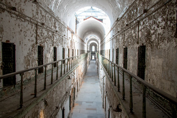 Fototapeta na wymiar Dusty hallway in an abandoned prison