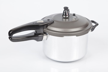 Closed pressure cooker; lid with safety valves