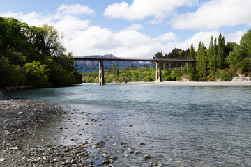 The landscape from Queenstown to Wanaka. New Zealand. Bridge crossing the river.New Zealand.