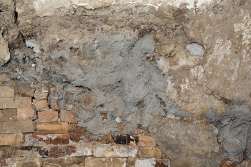 Old wall fixing, bricks, raw clay and mortar mix, strong texture