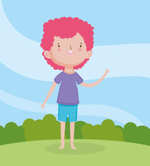 childrens day, little boy with casual clothes in the grass