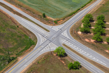 Fototapeta na wymiar Aerial view of rural highway crossroads in the Southern United States.