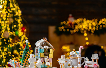 Christmas snowman with gift for santa. Merry Christmas and Happy Holidays. Presents in room....