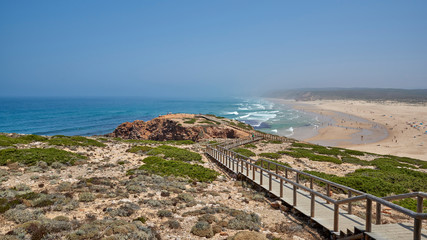 Fototapeta na wymiar Portugal. Lagos. West coast of the Atlantic. Bordeira Beach at the mouth of the Carrapateira River. View of the East from the second viewing platform