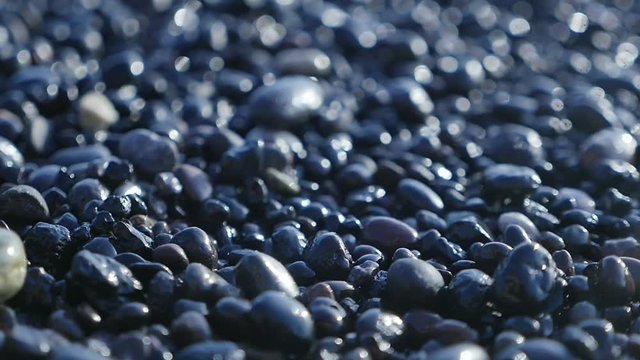  black beach pebble waves sea