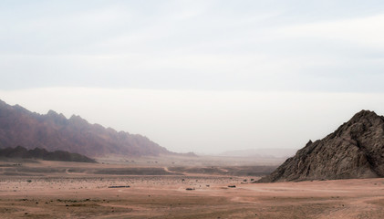 Fototapeta na wymiar panoramic view of desert with rocky mountains in Egypt