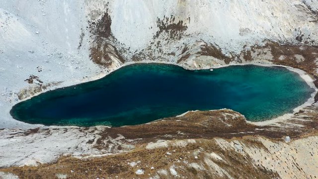 4K aerial view of Five color lake in Daocheng Yading nature reserve in Sichuan, Yunnan, China
