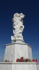 Die Statue der "Virgen del Carmen" steht an der Hafeneinfahrt von Garrucha/Andalusien und ist die Schutzpatronin aller Fischer in Spanien.