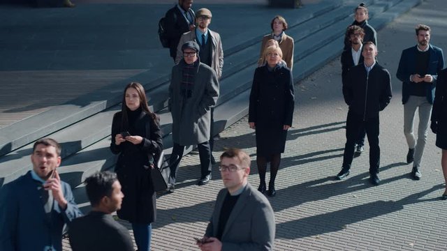 Multicultural Diverse Office Managers and Business People Suddenly Stop on the Street and Look Up. Unbelievable, Fantastic or Tragic Event Happening Live. 