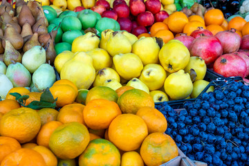 Naklejka na ściany i meble Various fresh fruits at farmer market. Vitamin.