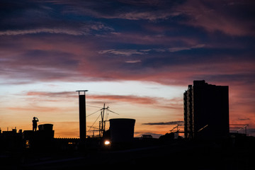 Silhouette of some buildings at sunset city landscape 