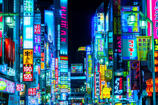 Tokyo, Japan -  - November 13, 2014: Billboards in Shinjuku's Kabuki-cho district. The area is a nightlife district known as Sleepless Town.