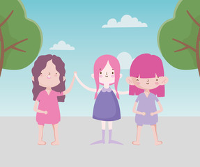 happy childrens day cute little girls holding hands trees foliage