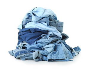Heap of different clothes on white background