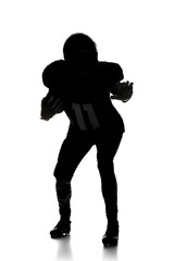 Silhouette of American football player on white background