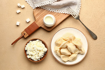 Composition with tasty dumplings and quark on color background