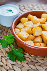 Spanish cuisine potato snack  -  patatas bravas.