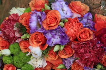 Orange and purple wedding flowers