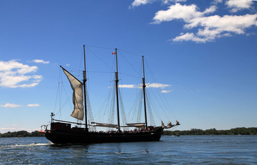 Fototapeta na wymiar Vintage ship on the water surface