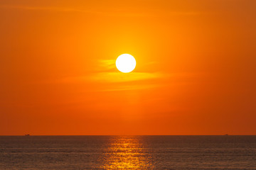 red sunset above the sea at Kata beach Phuket Thailand