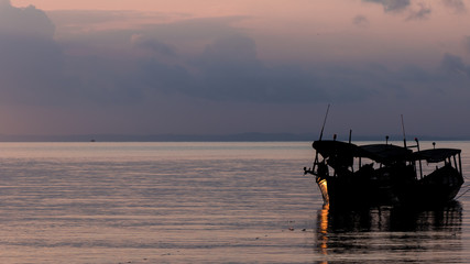 Koh Rong Island, Cambodia at Sunrise. strong vibrant Colors, Boats and Ocean